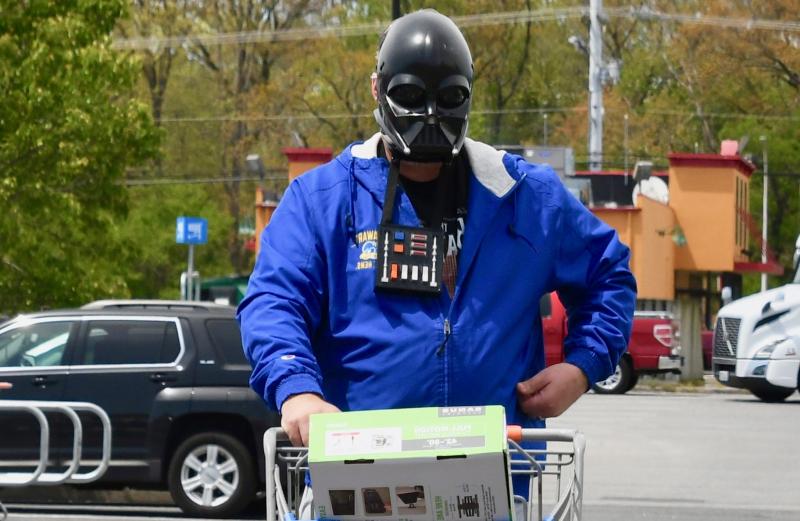 It had to happen. On the first day of mandatory face-covering requirements in Delaware, this Walmart shopper wears a Darth Vader mask. Starting April 28, face coverings are required when out in public. RON MACARTHUR PHOTO